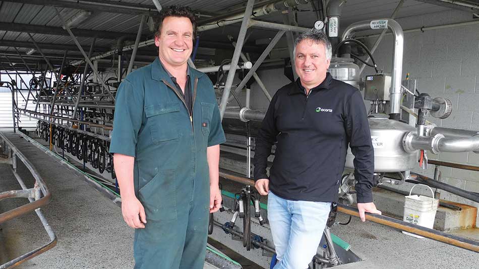 Milking consultant Josh Wheeler (right) says MaxT's farmer uptake is on the rise.