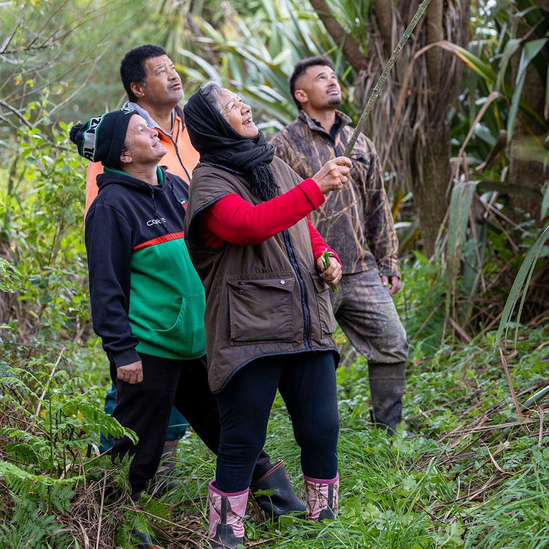 Whānau explore the riparian margin planted by the late Matua Paki Nikora. 