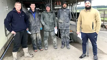 Five men standing together