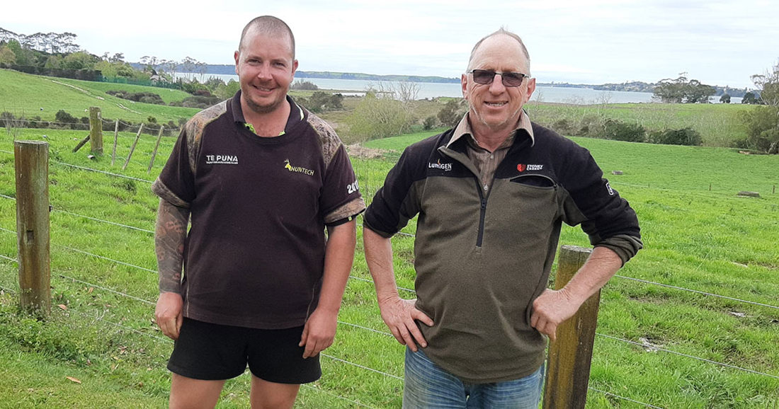Two men standing together
